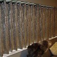 Pole in  recess eyelet headed curtains.